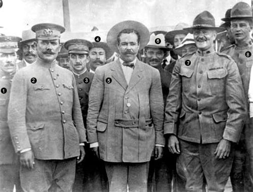 De izquierda a derecha y de acuerdo a la numeración indicada, aparecen: 1.- teniente coronel Serrano, 2.- Gral Álvaro Obregón, 3.- Emilio Madero, 4.- Luis Aguirre Benavides, 5.- Gral. Francisco Villa Arámbula, 6.- Dr. Lyman B. Rauchsman, 7.- Gral. John J. Pershing y 8.- George C. Patton. La ubicación corresponde a la mitad del puente internacional Cd. Juárez - El Paso y la fecha el 27 de agosto de 1914, previo a un banquete celebrado en su honor en el Fort Bliss. La foto corresponde a la colección de la Fototeca Nacional INAH de Pachuca y la identificación de los personajes me fue proporcionada por don José Abraham de León Fong, nieto del general Pablo Domínguez, subalterno del gral. Pánfilo Natera.